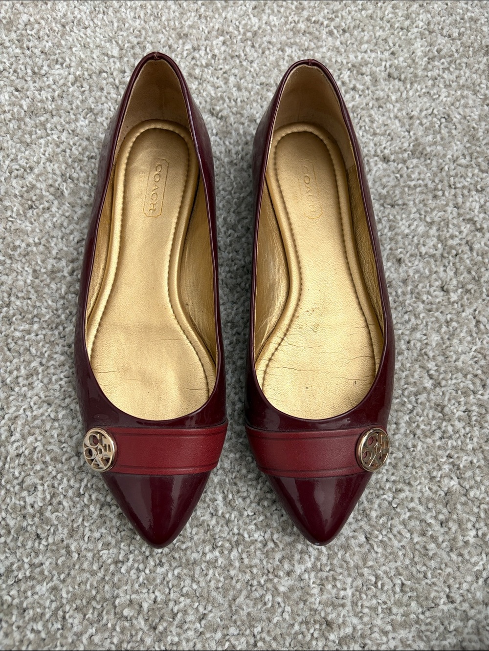 Coach Oneida Women's Burgundy Patent Pointed Toe Flats with Gold Logo
